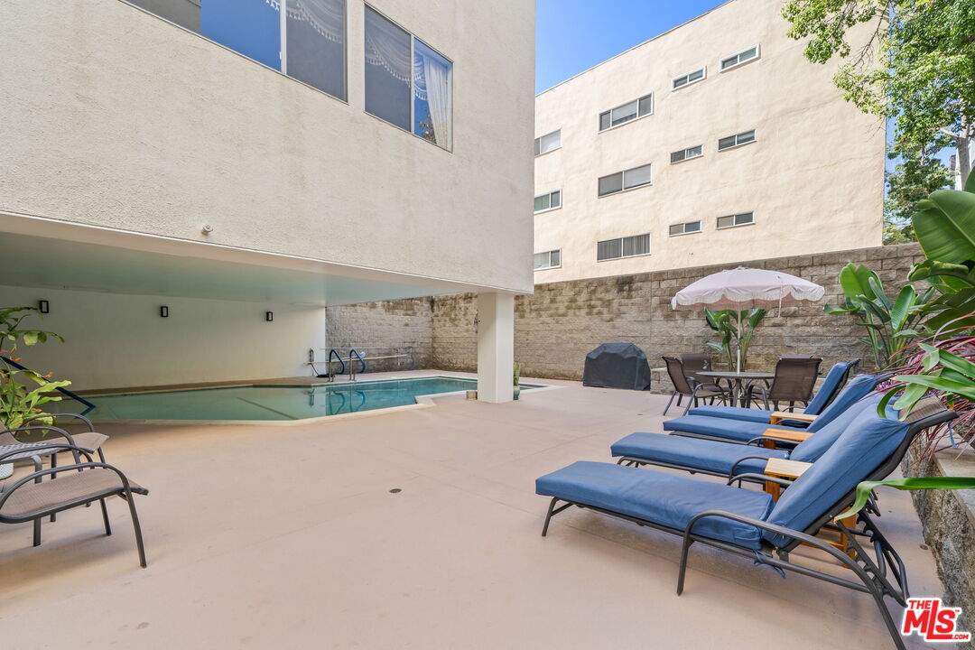 321 North Oakhurst Drive, Unit 403 Beverly Hills, CA 90210 - Photo 30 of 42 a outdoor space with a couch and chairs