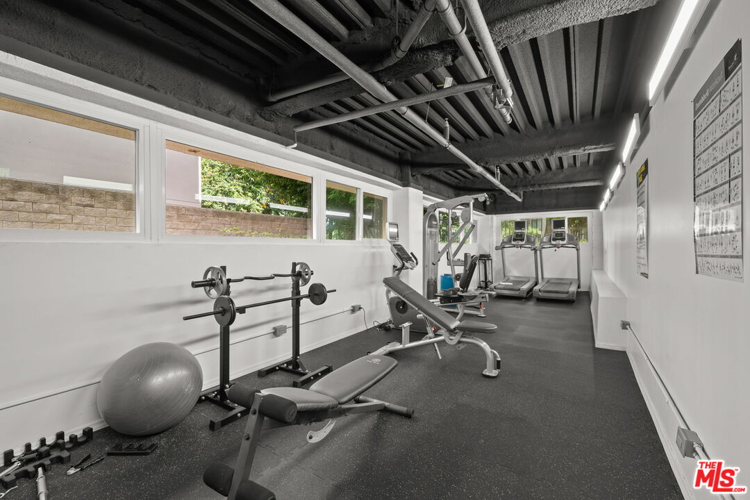 321 North Oakhurst Drive, Unit 403 Beverly Hills, CA 90210 - Photo 31 of 42 a view of a room with gym equipment