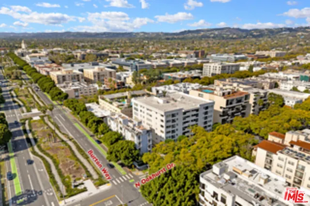 a view of street with parked cars