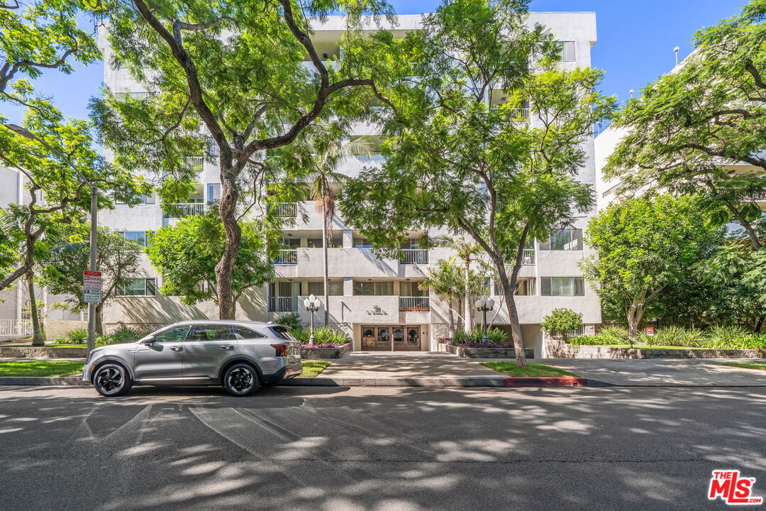 321 North Oakhurst Drive, Unit 403 Beverly Hills, CA 90210 - Photo 36 of 42 a view of street with parked cars