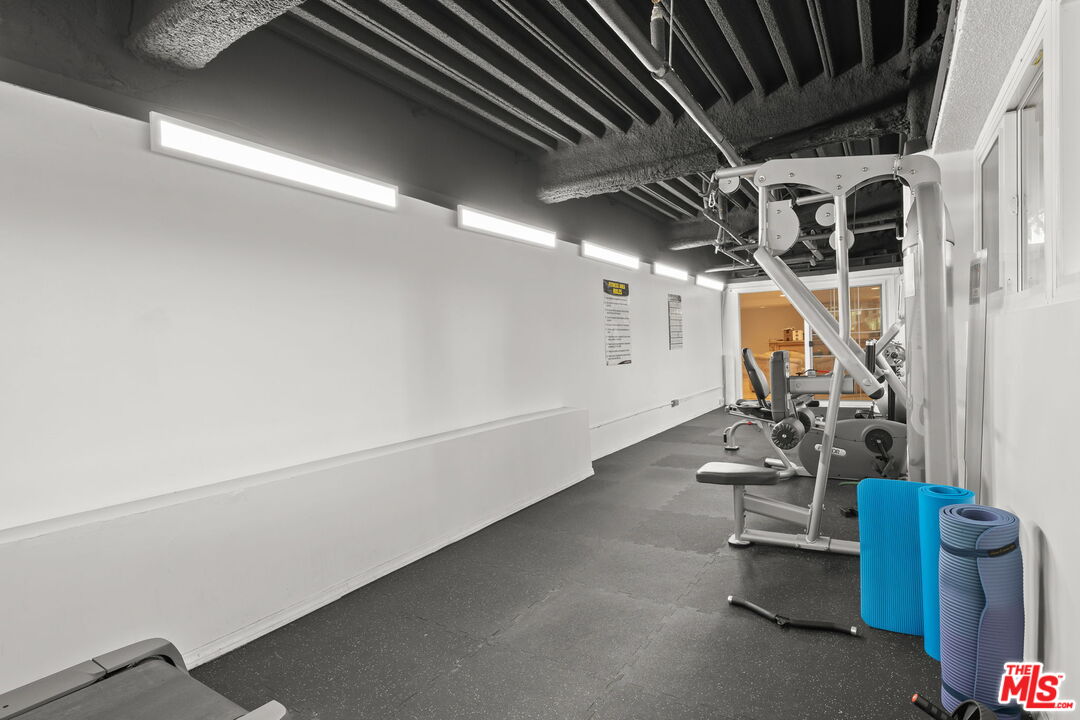 321 North Oakhurst Drive, Unit 403 Beverly Hills, CA 90210 - Photo 41 of 42 a view of a room with gym equipment