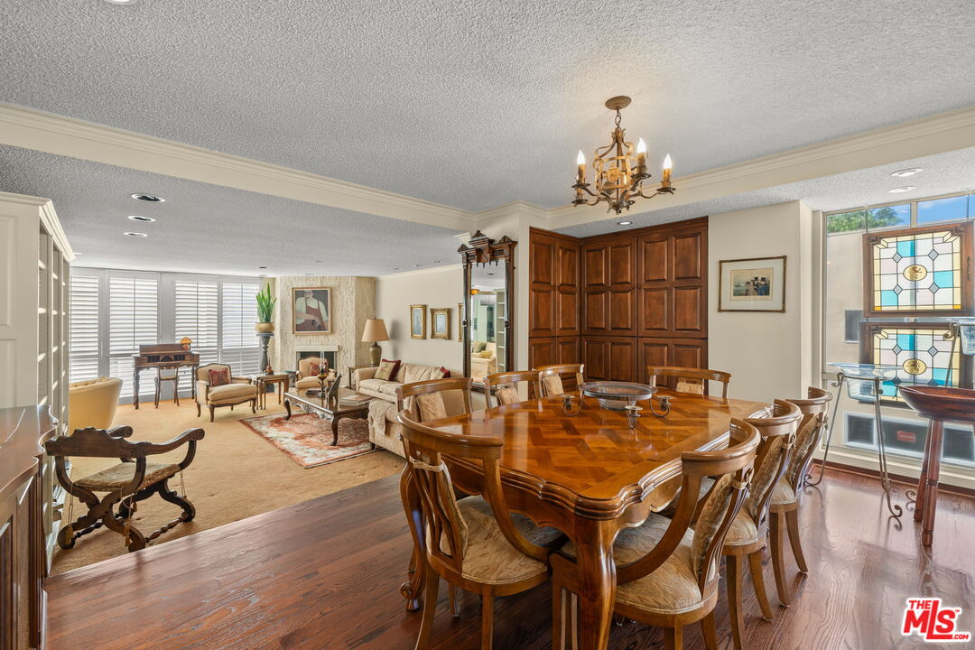 321 North Oakhurst Drive, Unit 403 Beverly Hills, CA 90210 - Photo 5 of 42 a view of a dining room with furniture window and outside view