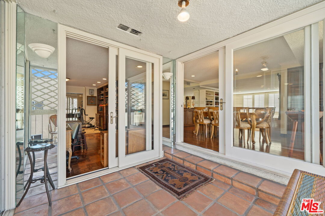 321 North Oakhurst Drive, Unit 403 Beverly Hills, CA 90210 - Photo 8 of 42 a view of a hallway and a livingroom with furniture