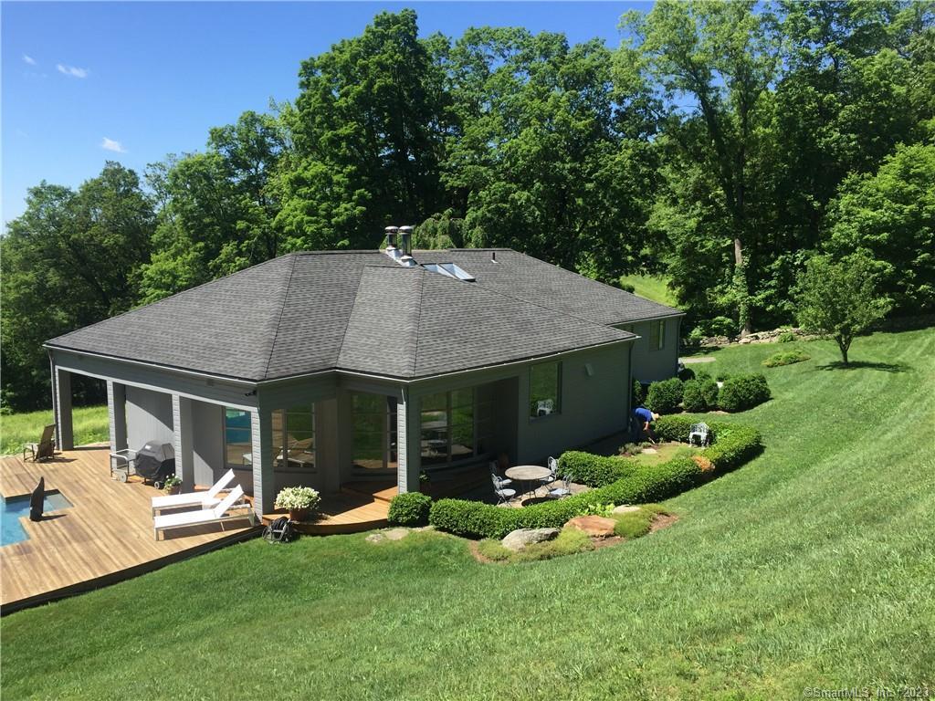 151 Treasure Hill Road Kent, CT 06785 - Photo 3 of 25 a view of a house with a yard porch and sitting area