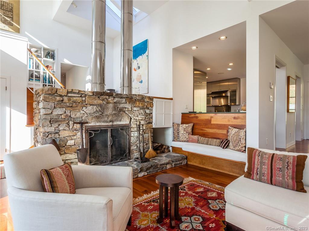 151 Treasure Hill Road Kent, CT 06785 - Photo 6 of 25 a living room with furniture and a fireplace