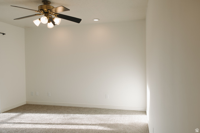 215 South 1050th West, Unit 10 Provo, UT 84601 - Photo 19 of 38 Spare room with recessed lighting, ceiling fan, and carpet