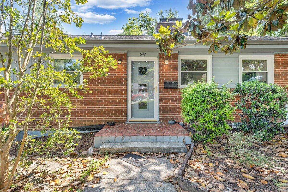 547 Dillard Road Southwest Roanoke, VA 24014 - Photo 2 of 26 a front view of a house with a yard