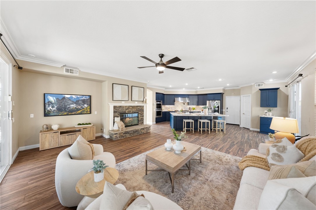 31465 Inverness Court Temecula, CA 92591 - Photo 25 of 75 Light-filled family room offers a comfortable gathering space with an elegant fireplace and seamless connection to the kitchen
aaaa
Professionally Staged