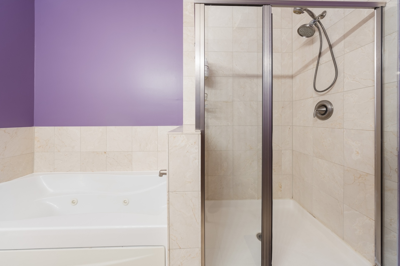 520 South State Street, Unit 1722 Chicago, IL 60605 - Photo 11 of 28 a bathroom with a bathtub and shower