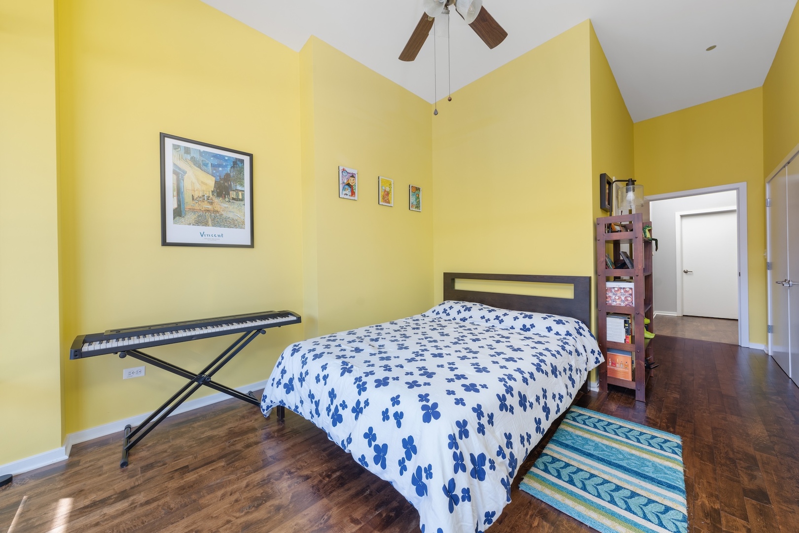 520 South State Street, Unit 1722 Chicago, IL 60605 - Photo 13 of 28 a bedroom with a bed and wooden floor
