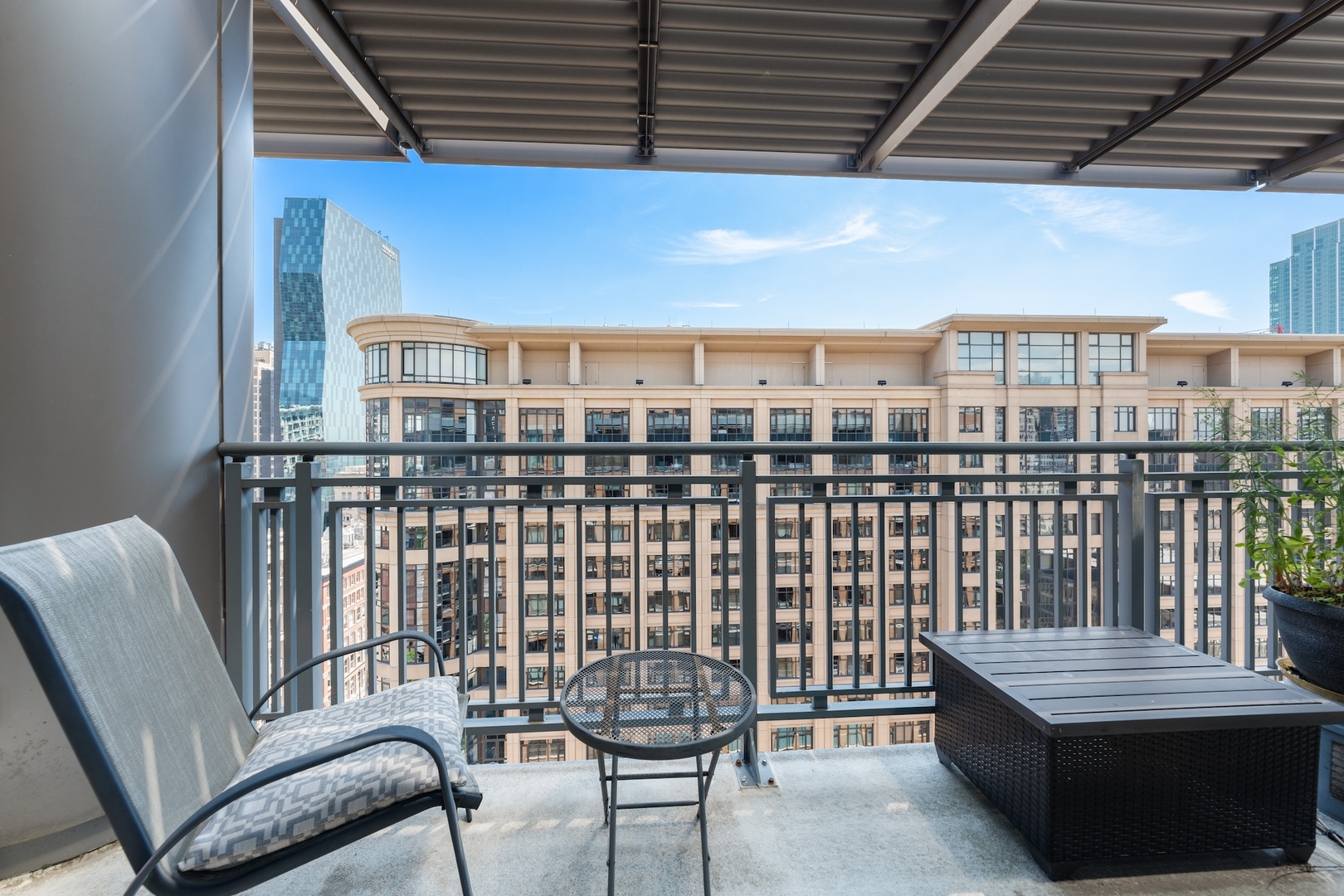 520 South State Street, Unit 1722 Chicago, IL 60605 - Photo 5 of 28 a view of a balcony with chairs