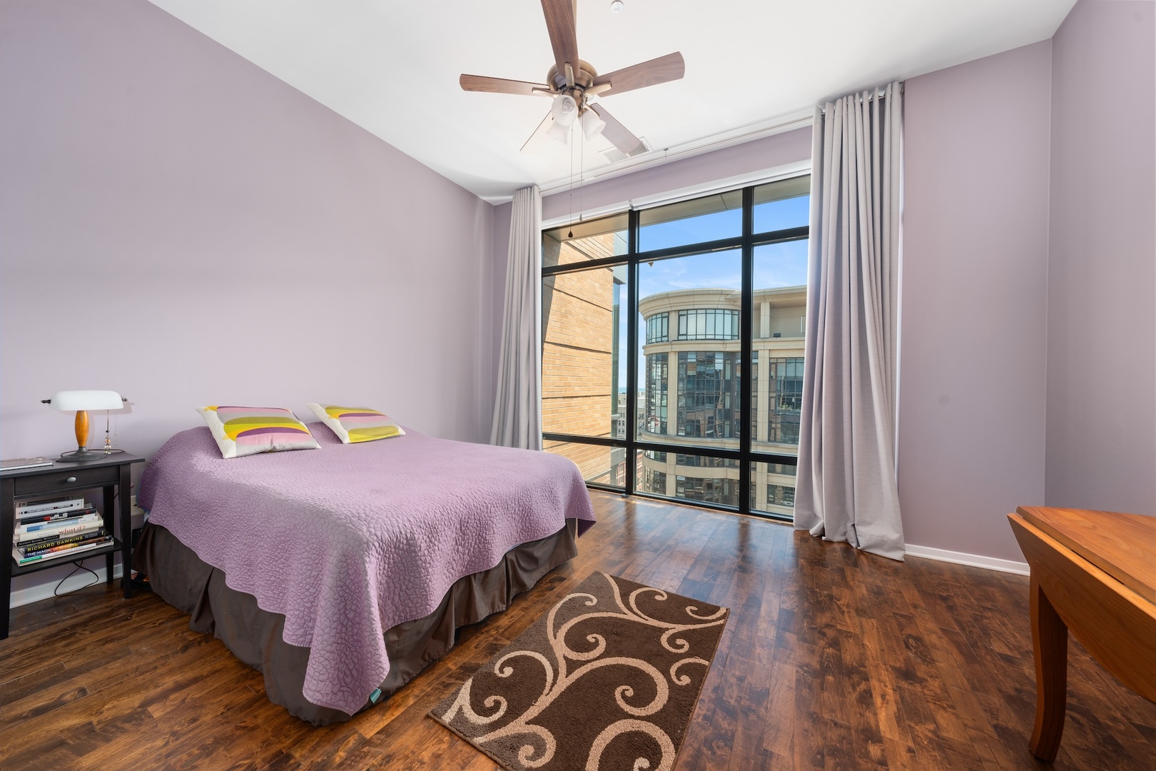 520 South State Street, Unit 1722 Chicago, IL 60605 - Photo 8 of 28 a bedroom with a bed and window