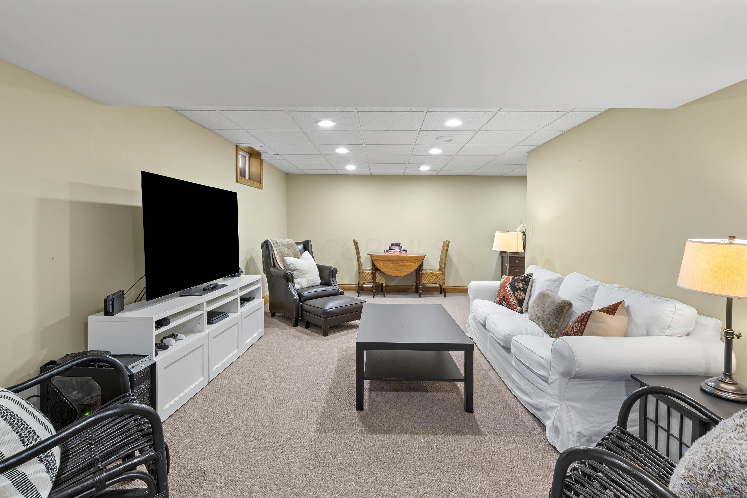 1364 Dale Ford Road Delaware, OH 43015 - Photo 73 of 112 • Berber carpet • Sage painted walls • Can lighting • Acoustic ceiling tiles • Main water shut off