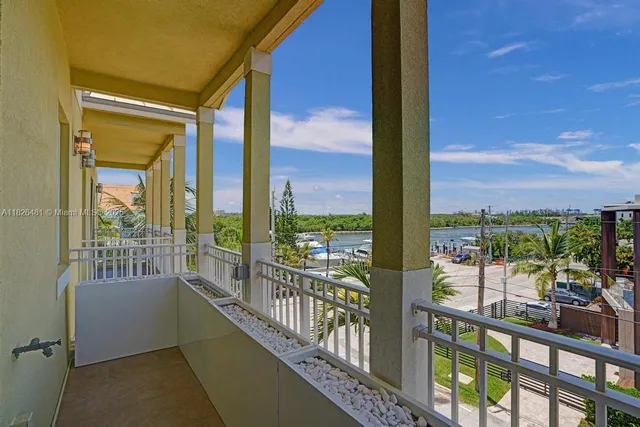 a work room with furniture and a flat screen tv