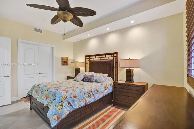 a view of staircase with white walls and white cabinet