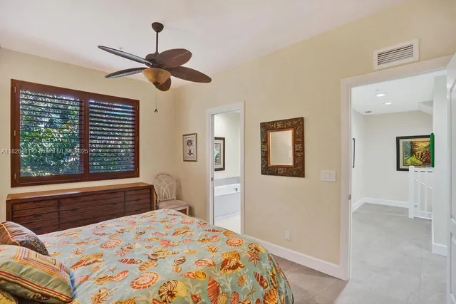 a potted plant sitting on the side of a brick building