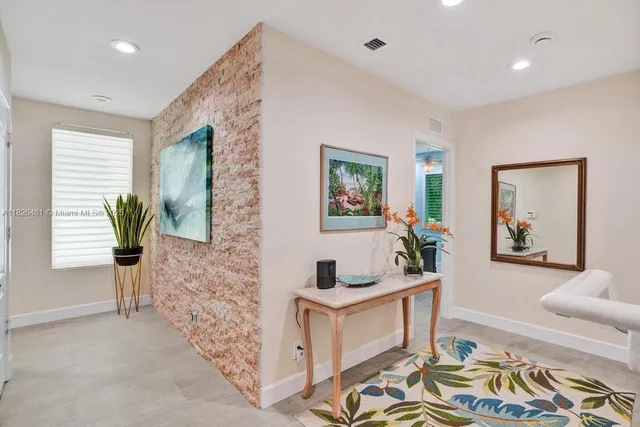 a picture of a bench in front of a white house