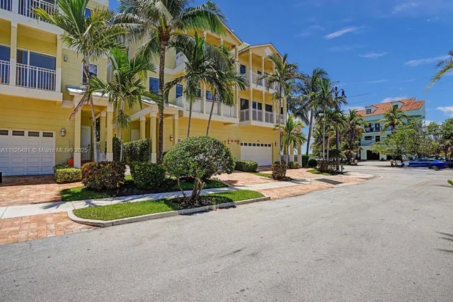 a kitchen with a table and chairs in it