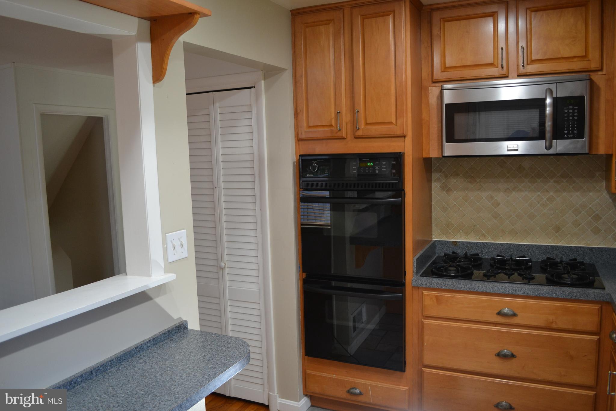 3905 Lantern Drive Silver Spring, MD 20902 - Photo 9 of 24 Kitchen has a double oven and gas cooktop