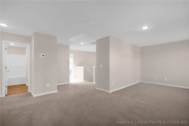 a bathroom with a double vanity sink toilet and shower
