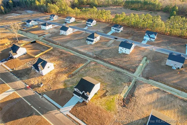 a view of a terrace with chairs and a table