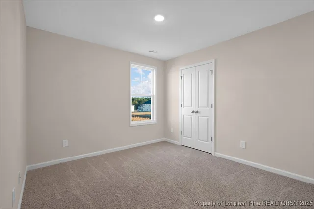 a view of a pool with a yard