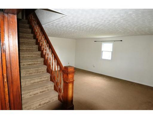 73 Baker Road Greenville, PA 16125 - Photo 8 of 18 Living Room. BIG LIVING ROOM WITH ORIGINAL STAIRCASE AND WOOD TRIM, BEAUTIFUL CONDITION