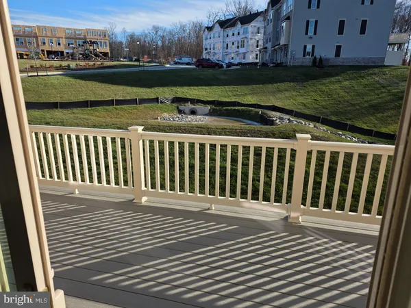 a view of a wooden fence