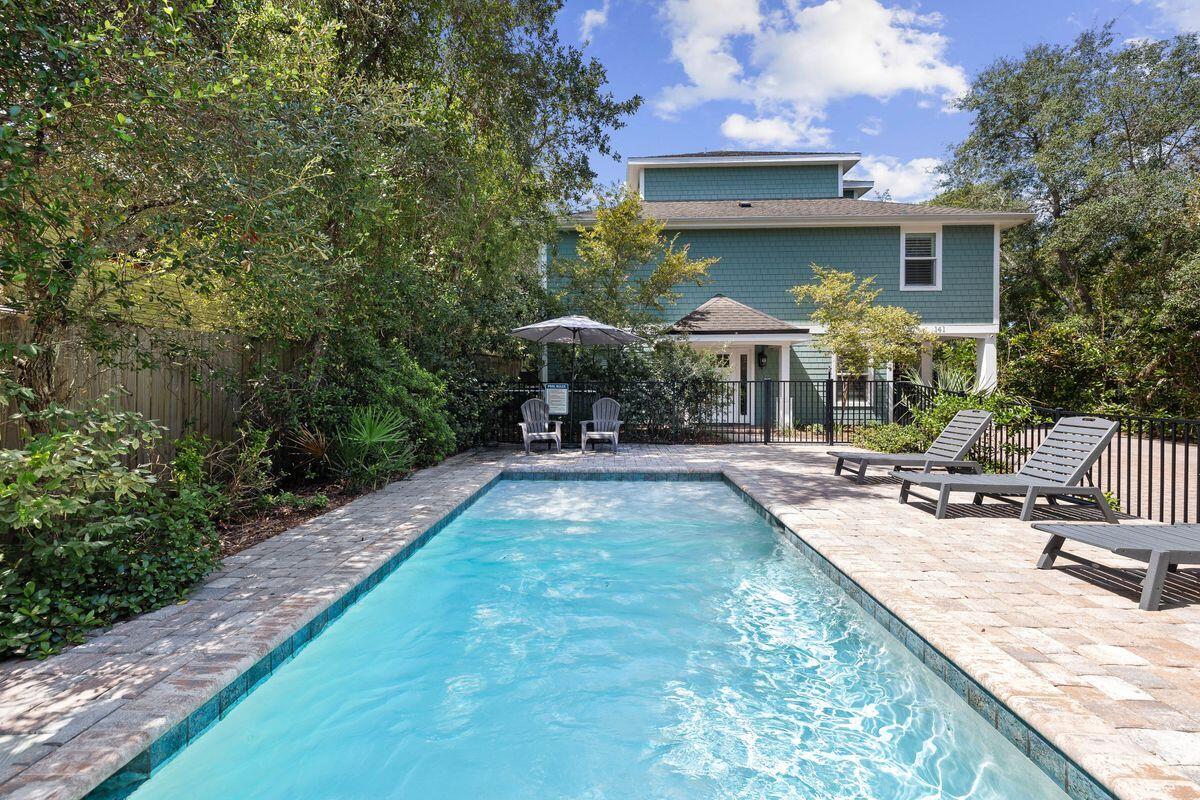 141 Crescent Road Santa Rosa Beach, FL 32459 - Photo 1 of 40 a view of a house with backyard and sitting area