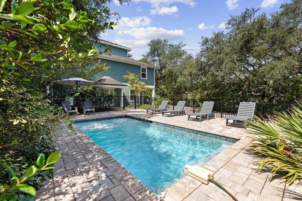 141 Crescent Road Santa Rosa Beach, FL 32459 - Photo 15 of 40 a view of a house with backyard porch and sitting area