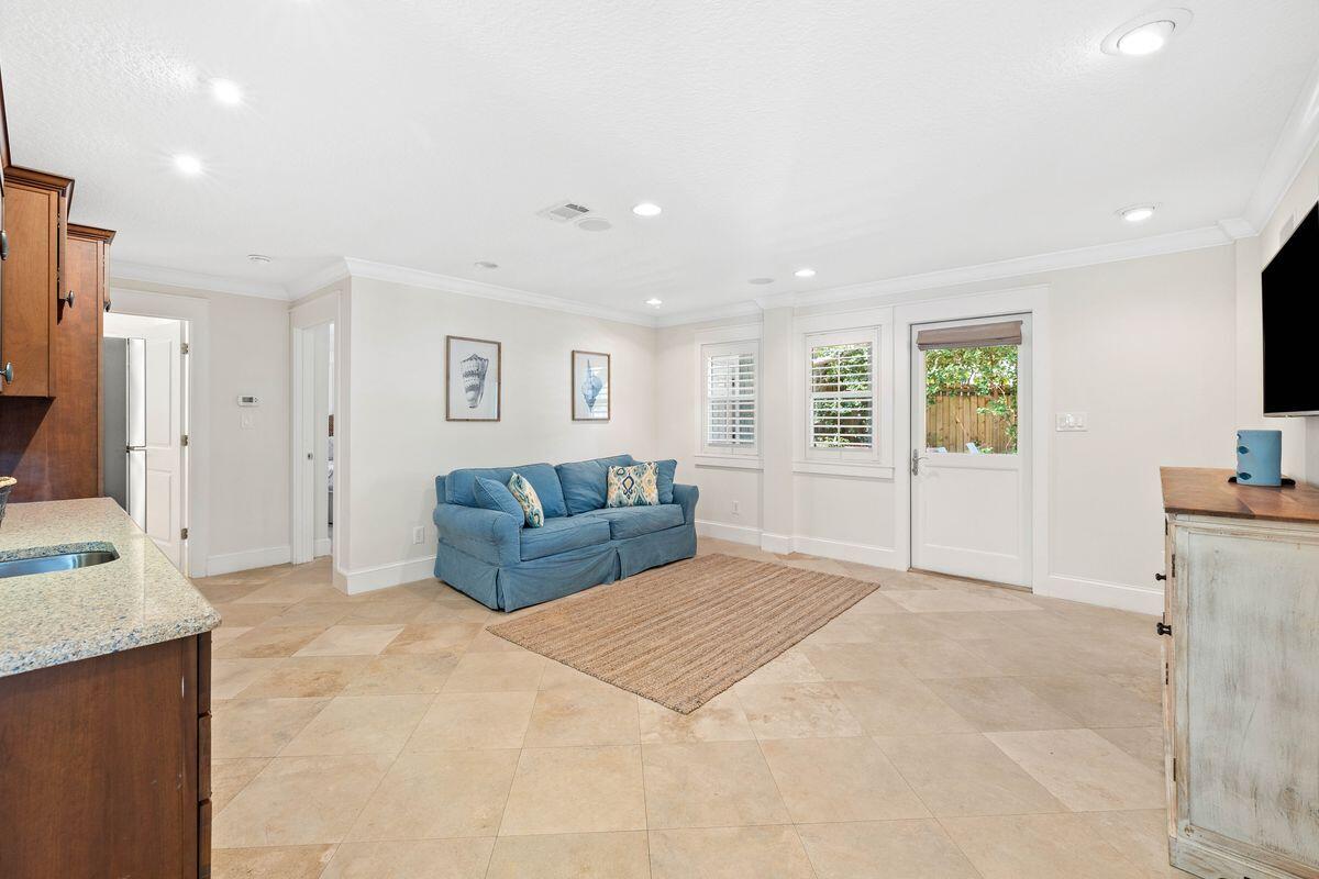 141 Crescent Road Santa Rosa Beach, FL 32459 - Photo 26 of 40 a living room with furniture and a flat screen tv