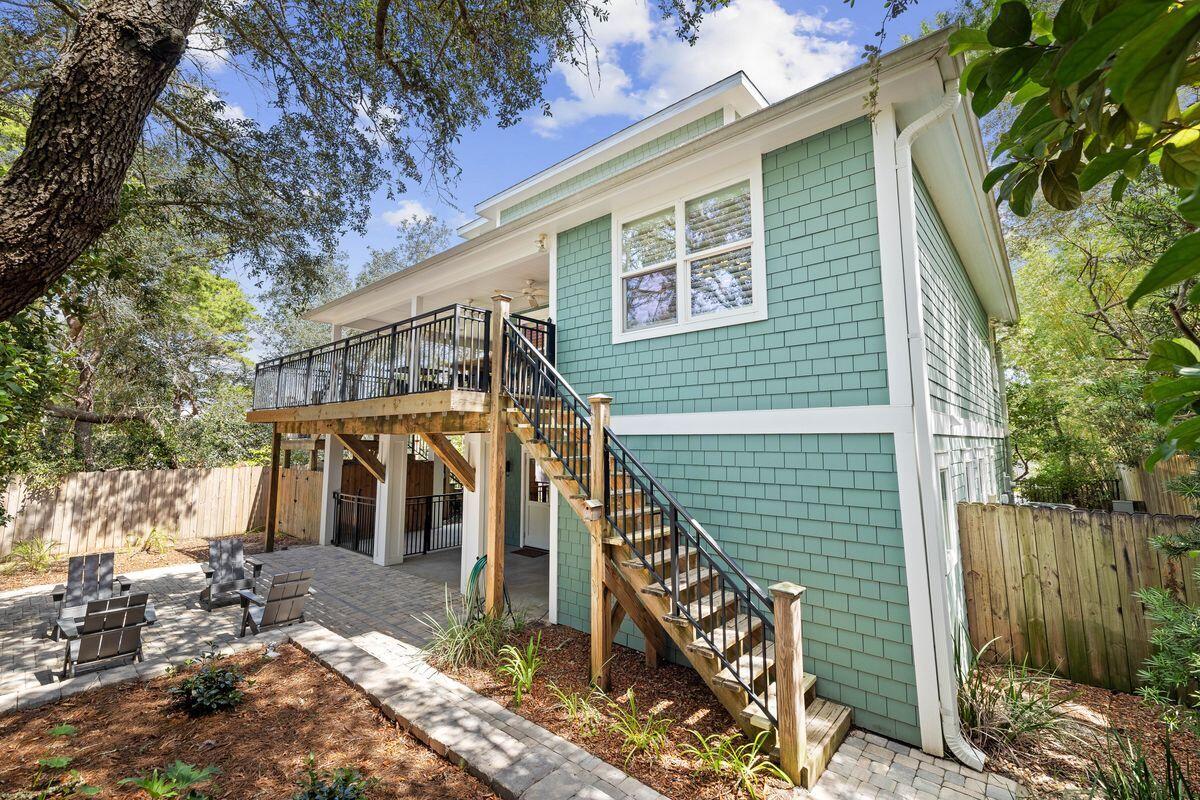 141 Crescent Road Santa Rosa Beach, FL 32459 - Photo 36 of 40 a view of a house with wooden fence