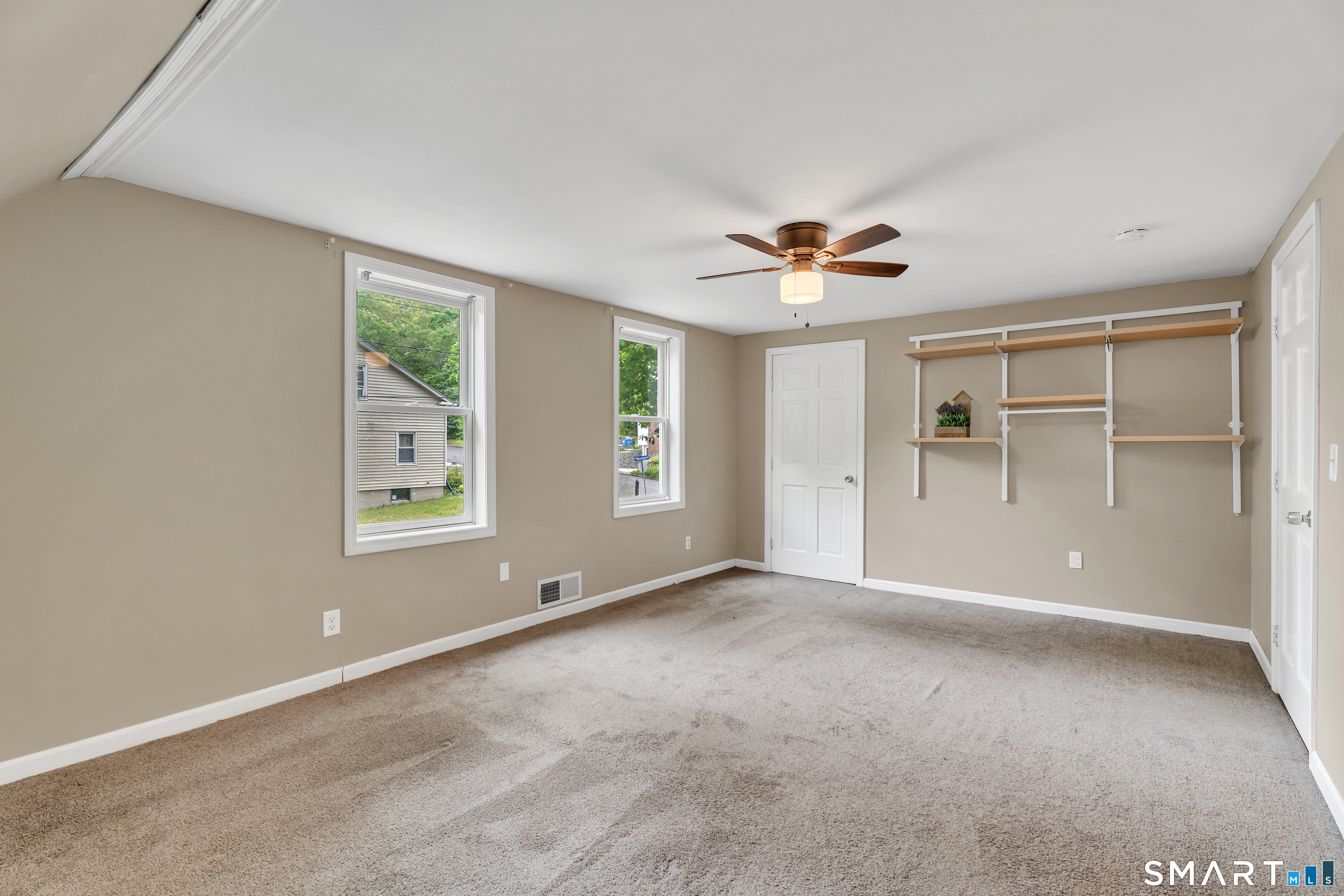 75 Summit Street Norwich, CT 06360 - Photo 32 of 40 a view of an empty room with a window