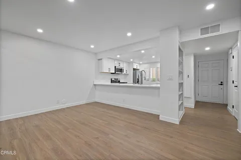 a view of kitchen with wooden floor