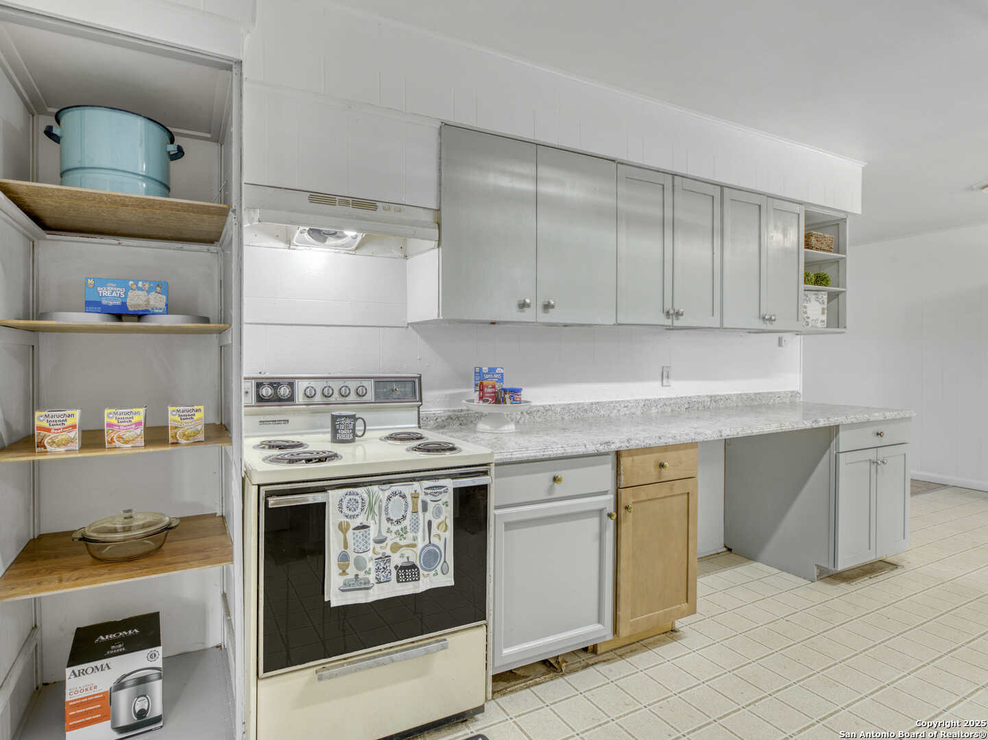 2019 North Park Road Canyon Lake, TX 78133 - Photo 9 of 22 a kitchen with stainless steel appliances granite countertop a stove and a sink