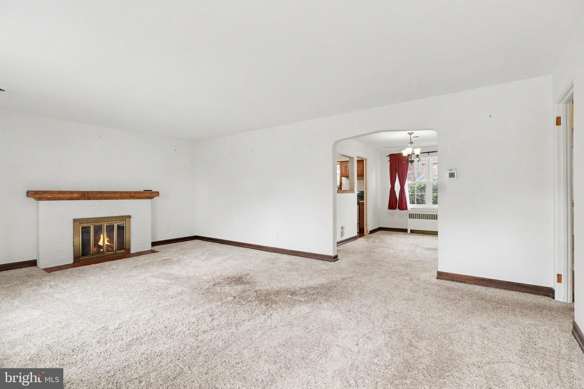 3606 Bonnyview Road Harrisburg, PA 17109 - Photo 15 of 34 an empty room with furniture and a fireplace