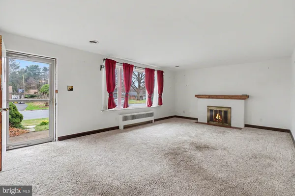 an empty room with window