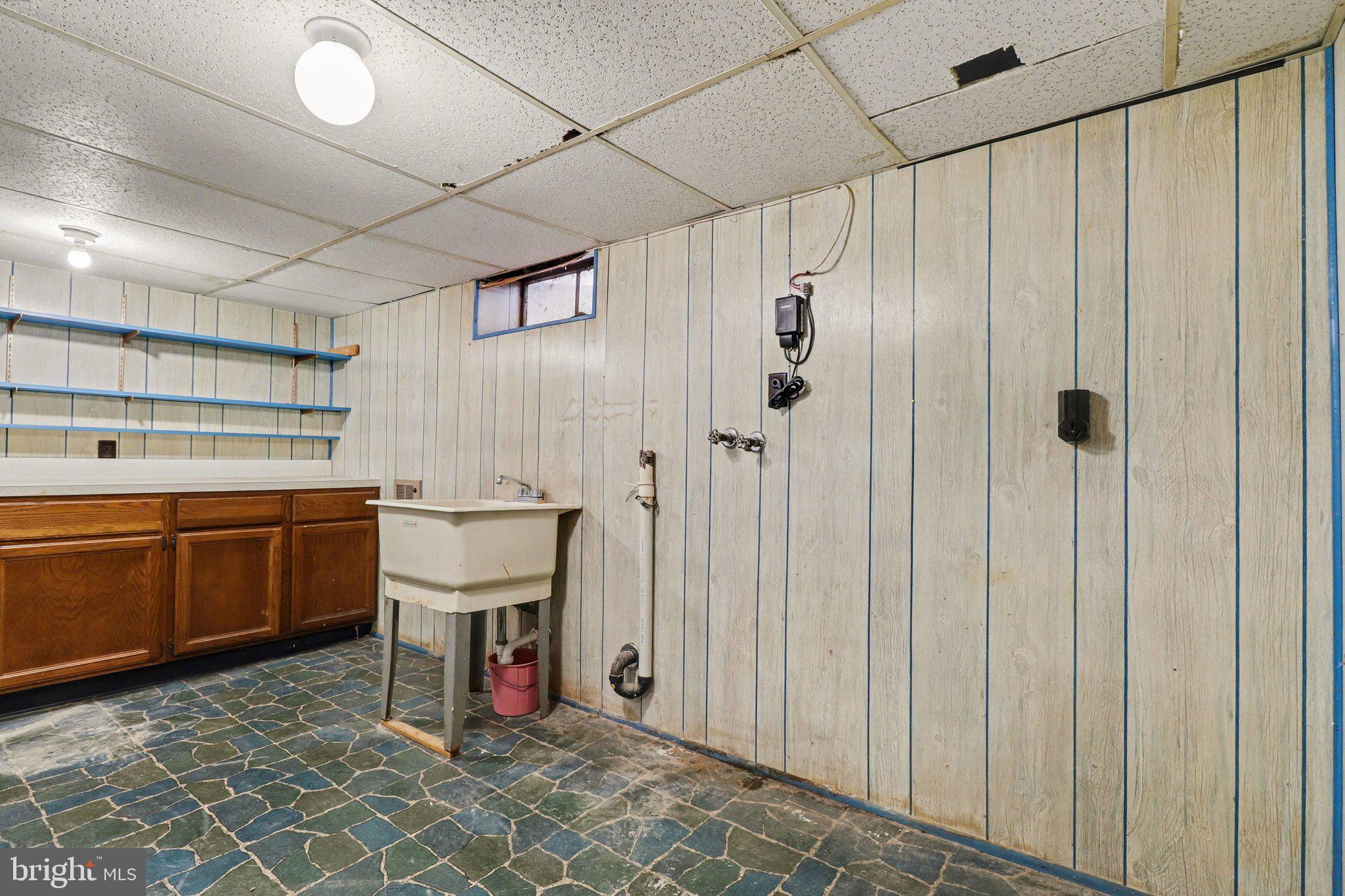 3606 Bonnyview Road Harrisburg, PA 17109 - Photo 23 of 34 a kitchen with a sink and cabinets