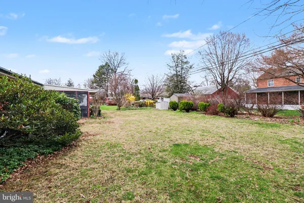 a bird view of house and outdoor space