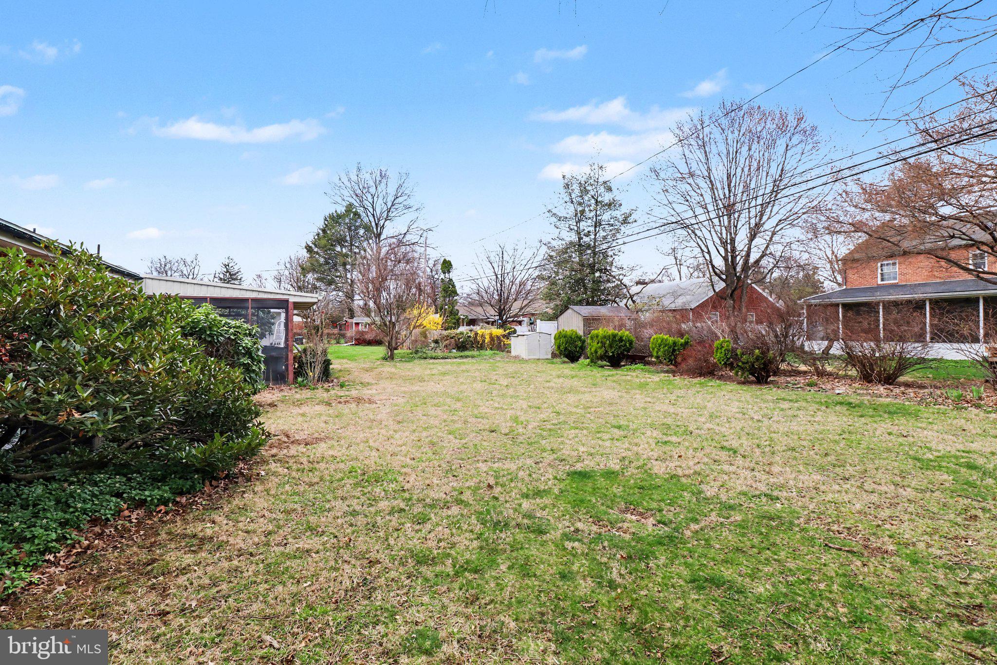 3606 Bonnyview Road Harrisburg, PA 17109 - Photo 29 of 34 a view of a yard with plants and large trees