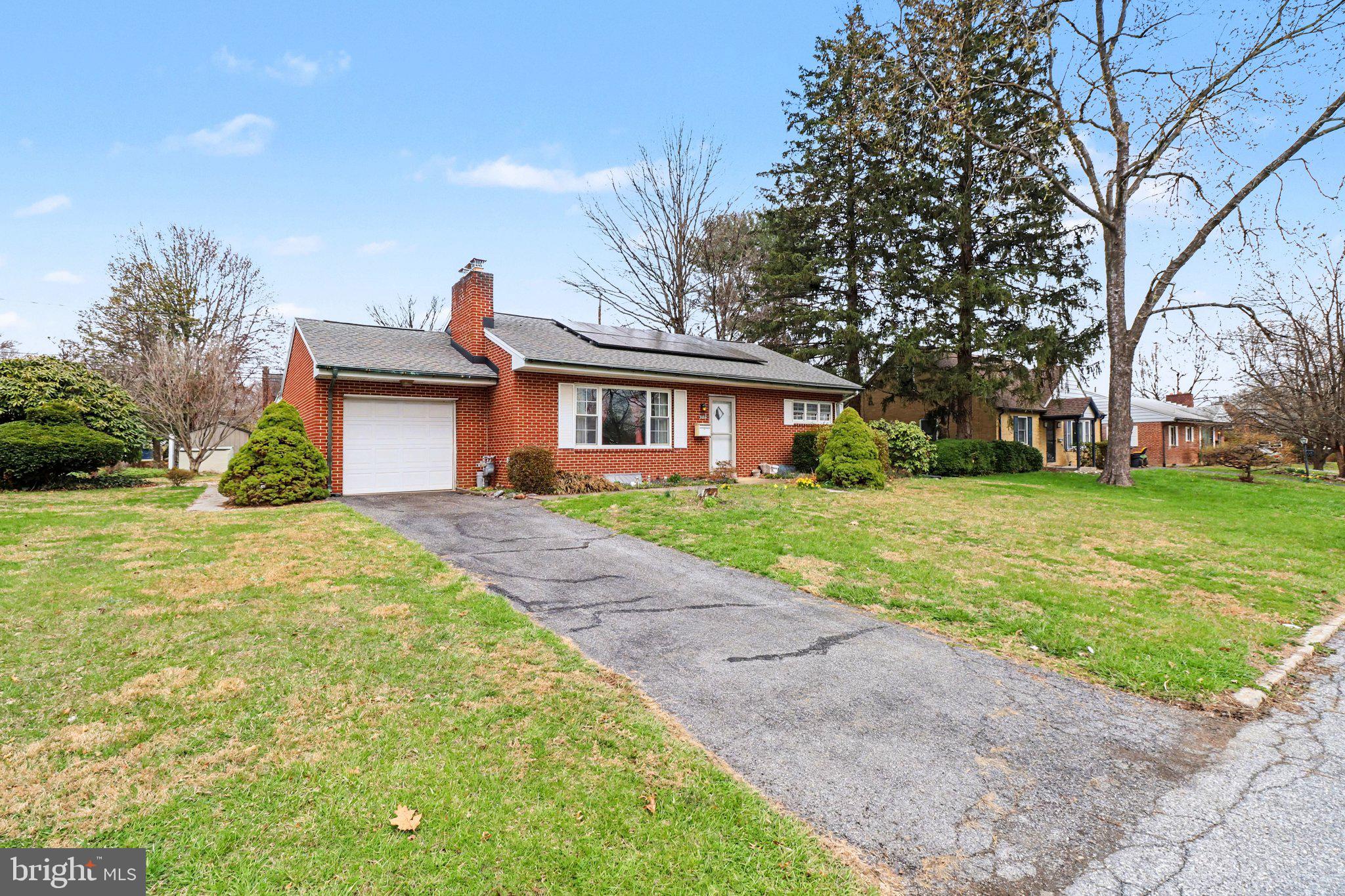 3606 Bonnyview Road Harrisburg, PA 17109 - Photo 4 of 34 a front view of a house with garden