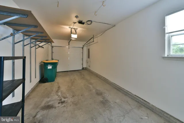 en empty room with windows