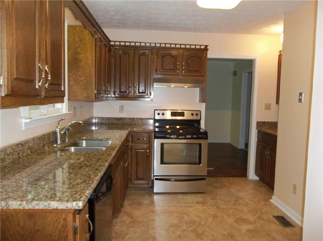 1825 Hidden Ridge Circle Mount Juliet, TN 37122 - Photo 2 of 12 Kitchen with new granite and new floor. 2 Pantries