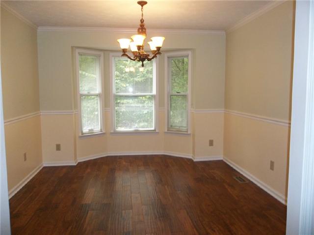 1825 Hidden Ridge Circle Mount Juliet, TN 37122 - Photo 4 of 12 Formal Dining with new wood floor, fashion chandelier, bay window.