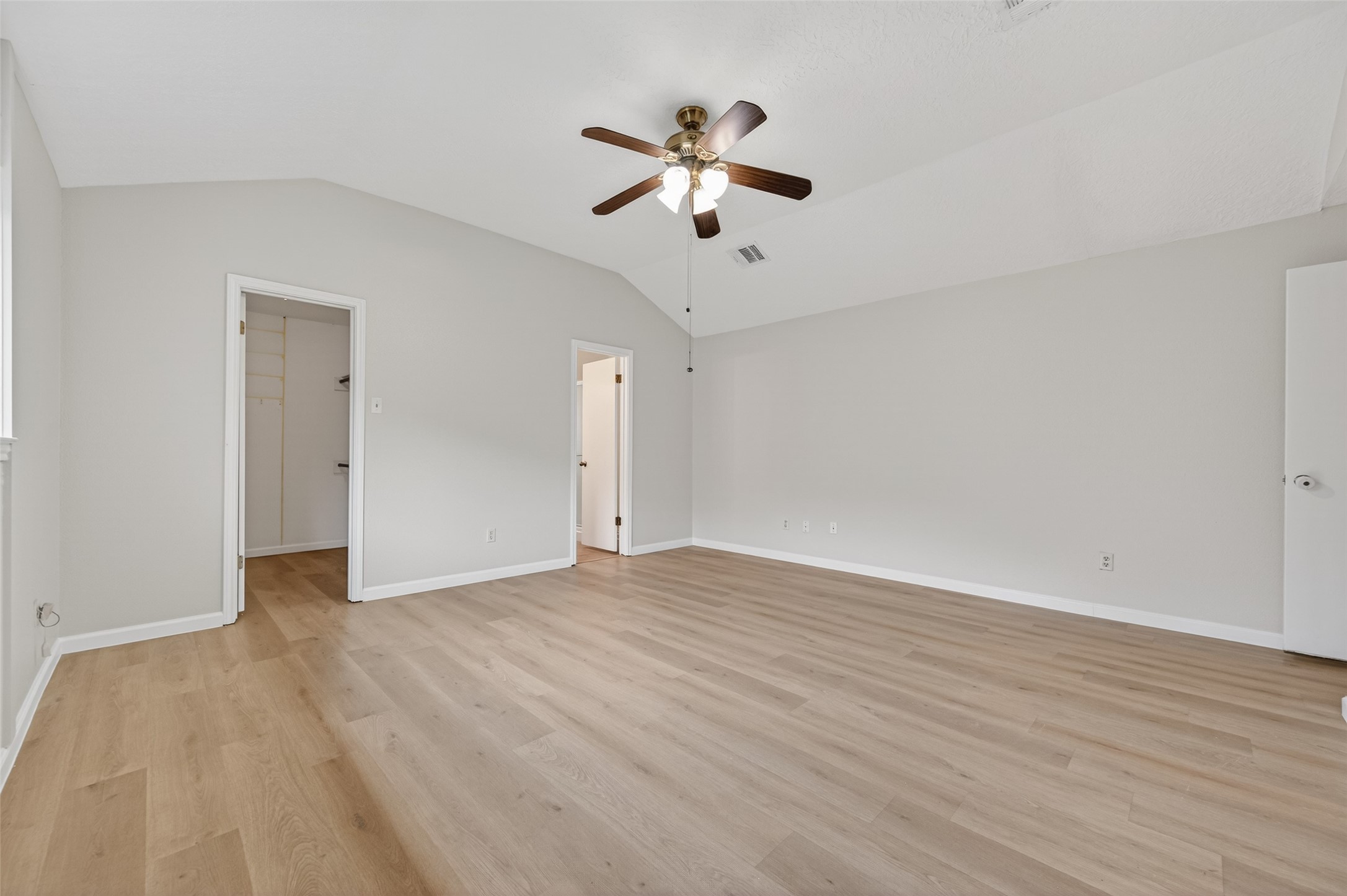 21315 Meadowhill Drive Spring, TX 77388 - Photo 16 of 31 a view of an empty room with wooden floor