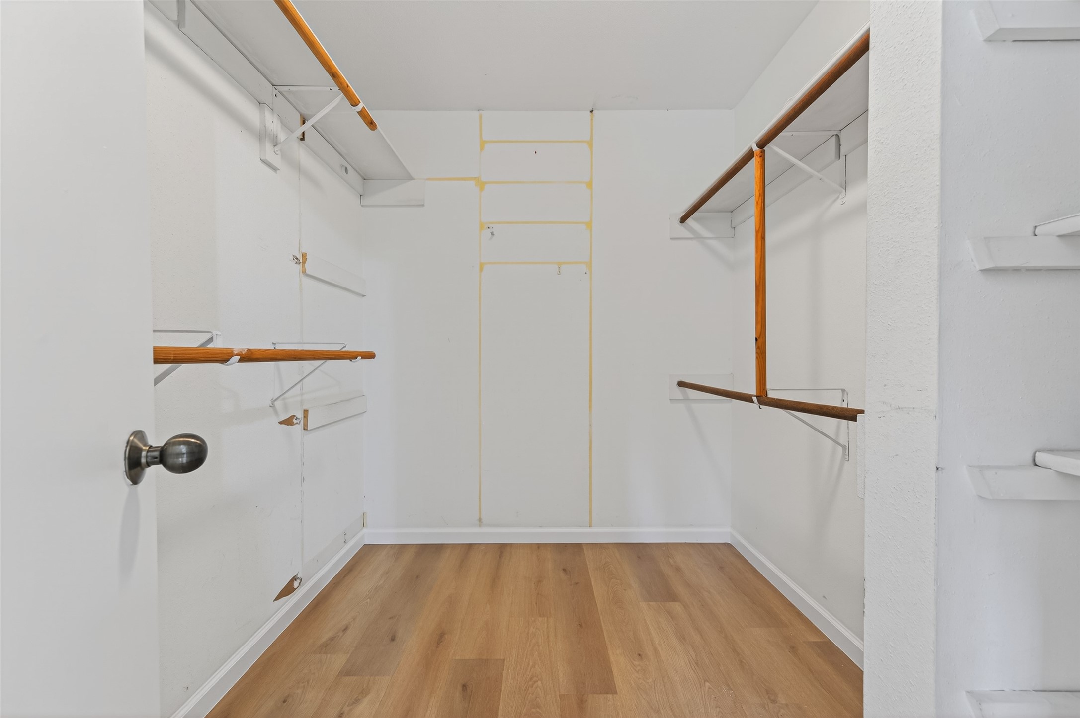 21315 Meadowhill Drive Spring, TX 77388 - Photo 18 of 31 a view of a room with wooden floor and shower