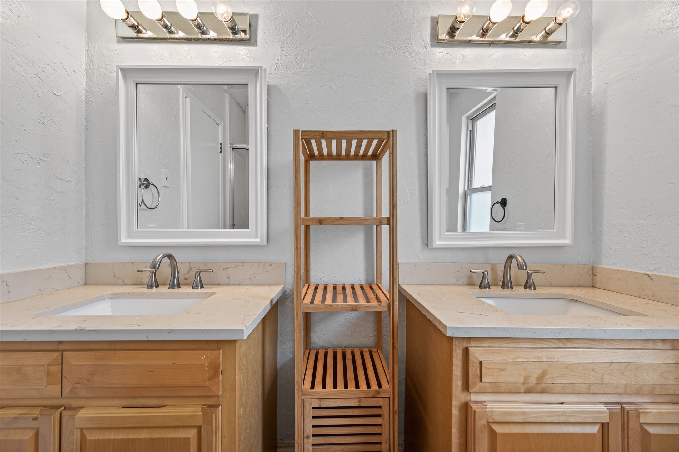 21315 Meadowhill Drive Spring, TX 77388 - Photo 20 of 31 a bathroom with a sink and a mirror