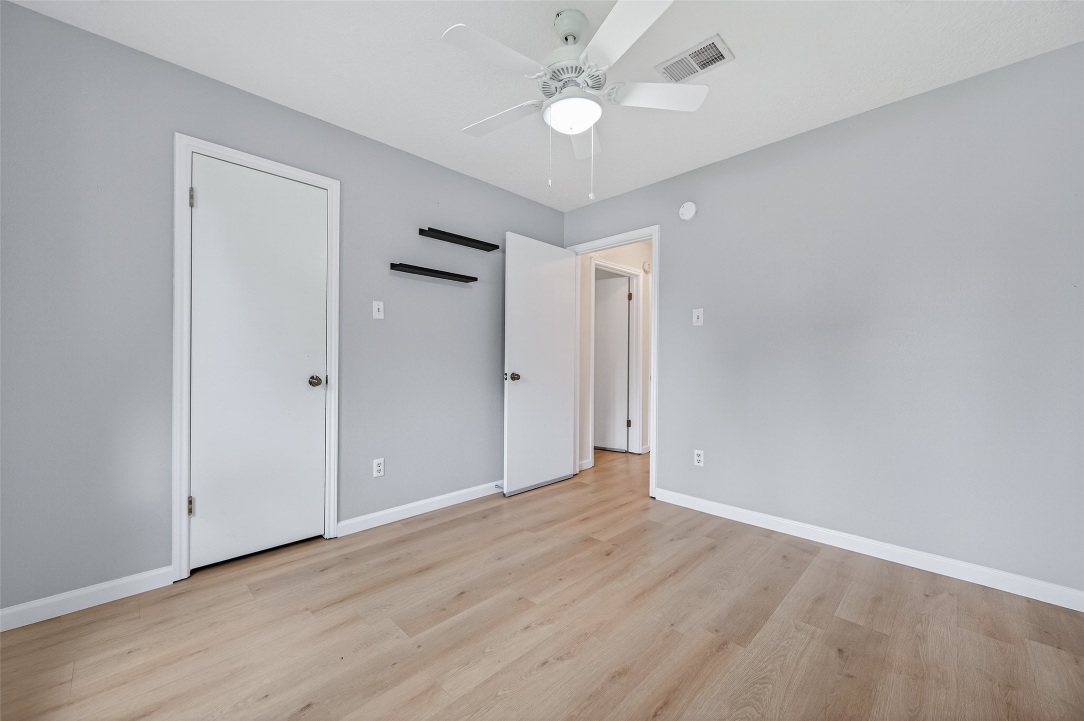 21315 Meadowhill Drive Spring, TX 77388 - Photo 23 of 31 a view of an empty room with a fan