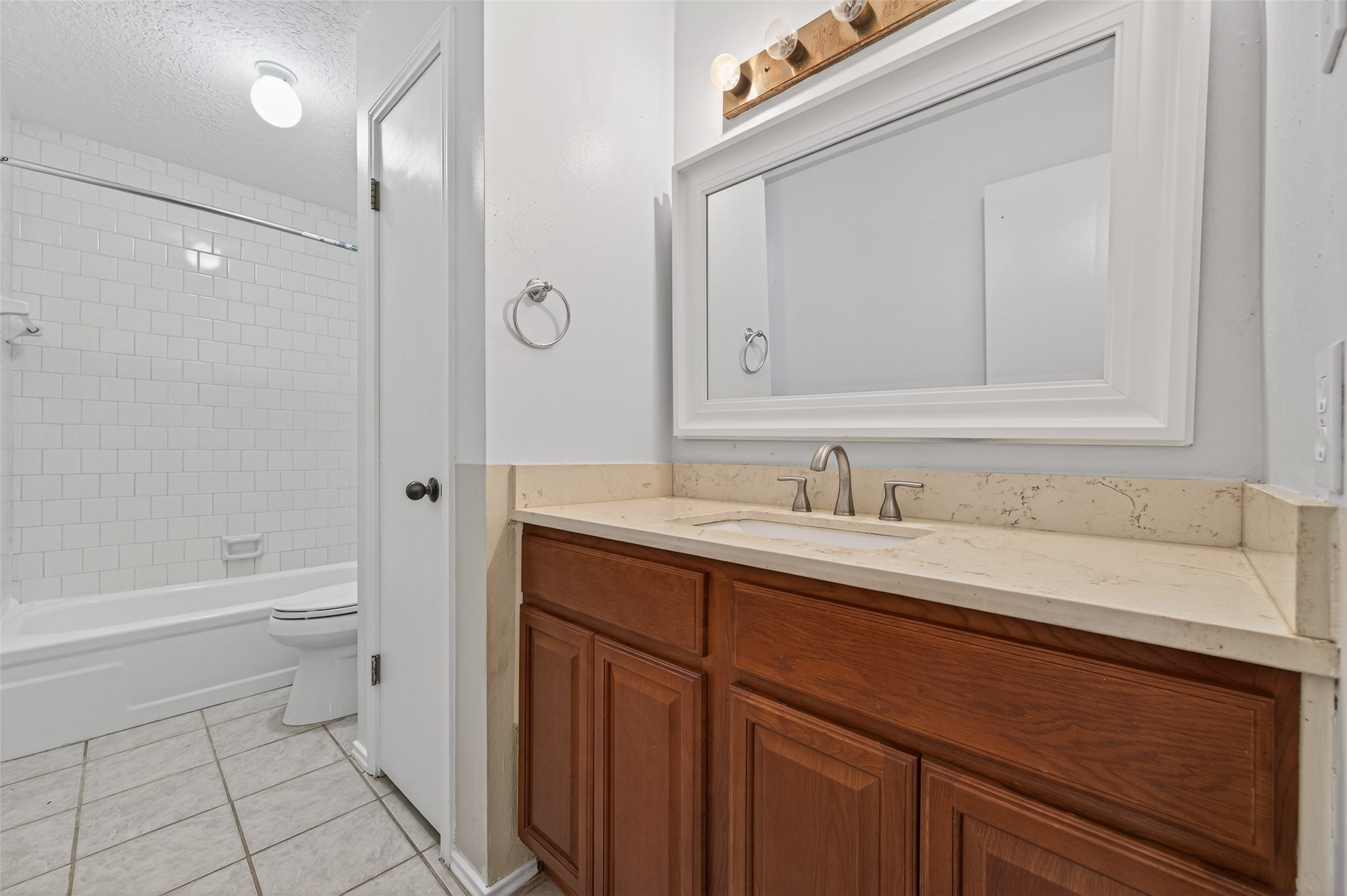 21315 Meadowhill Drive Spring, TX 77388 - Photo 24 of 31 a bathroom with a sink a toilet and a bathtub