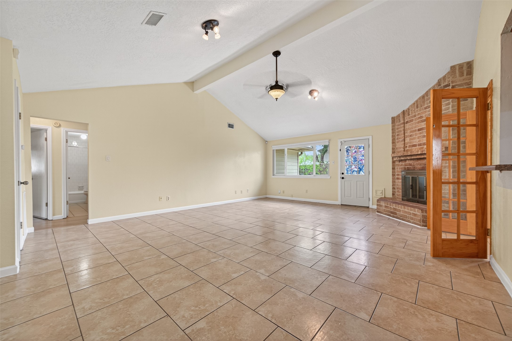 21315 Meadowhill Drive Spring, TX 77388 - Photo 5 of 31 a view of an empty room with a window